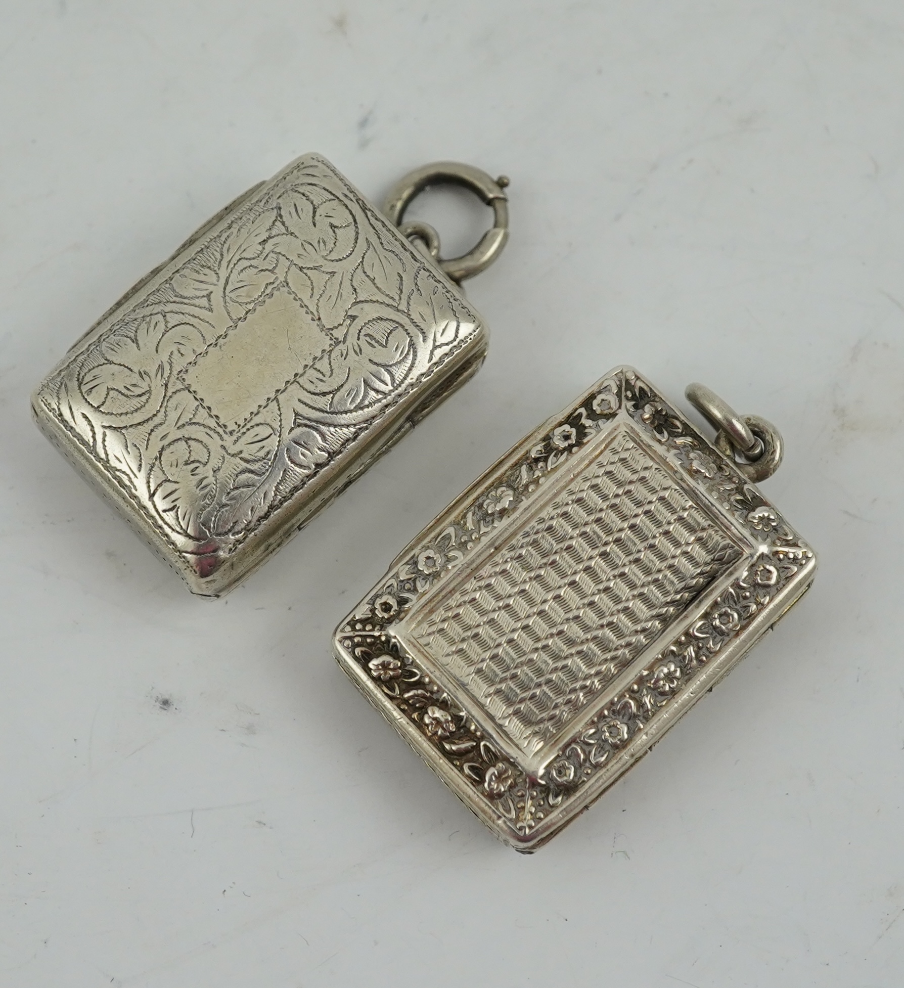 A George IV engraved and embossed silver rectangular vinaigrette by John Bettridge, Birmingham, circa. 1825, 32mm and a William IV vinaigrette by Thomas Simpson Jn. Birmingham, 1836.